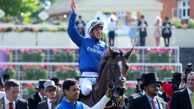 Jockey James Doyle celebrates at Ascot