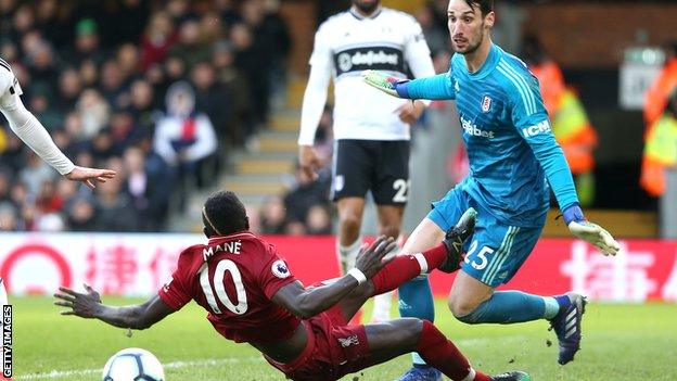 Sergio Rico fouls Sadio Mane