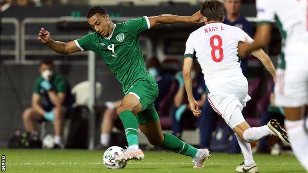 Adam Idah attempts to burst away from Hungary's Adam Nagy during the June friendly