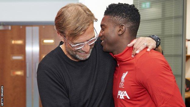 Liverpool coach Jurgen Klopp with Taiwo Awoniyi