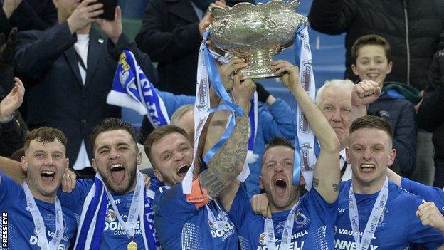 Dungannons Ryan Harpur and Terry Fitzpatrick lift the Irish League Cup