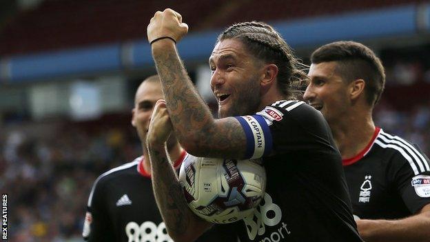 Henry Lansbury celebrates his goal for Nottingham Forest