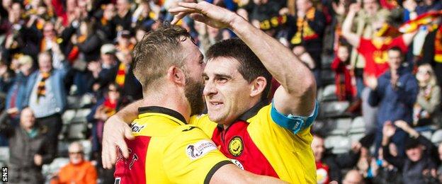 Partick Thistle's Christie Elliott and Kris Doolan celebrate