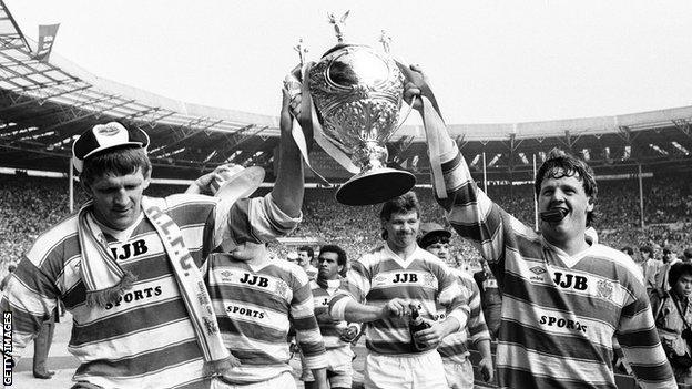 Wigan celebrate with the Challenge Cup