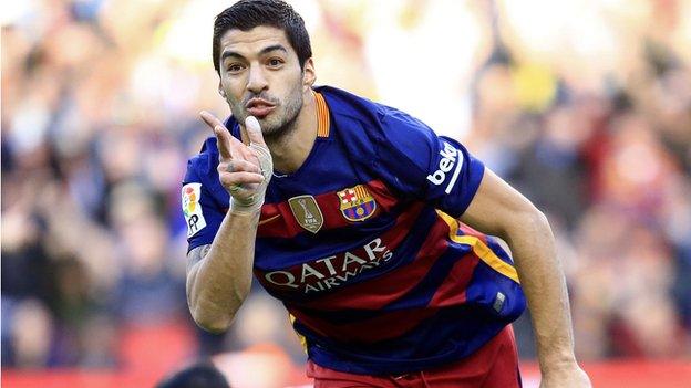 Luis Suarez celebrates scoring for Barcelona against Atletico Madrid