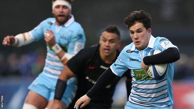 Sam Johnson carries the ball for Glasgow against Saracens