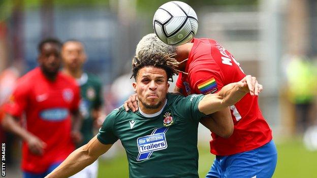 Wrexham's Theo Vassell in action against Dagenham