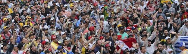 Fans in the rain