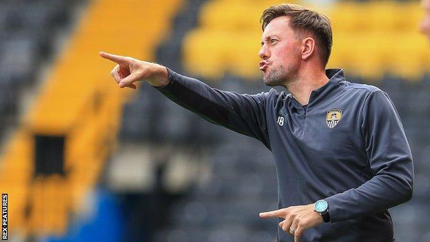 Ian Burchnall directs his Notts County players from pitch side