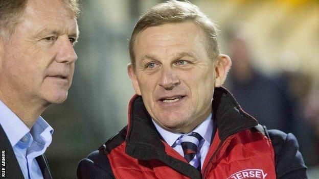 Mark Morgan (right) in conversation at a Jersey Reds match