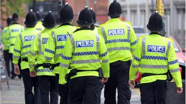 Police officers in high-viz jackets