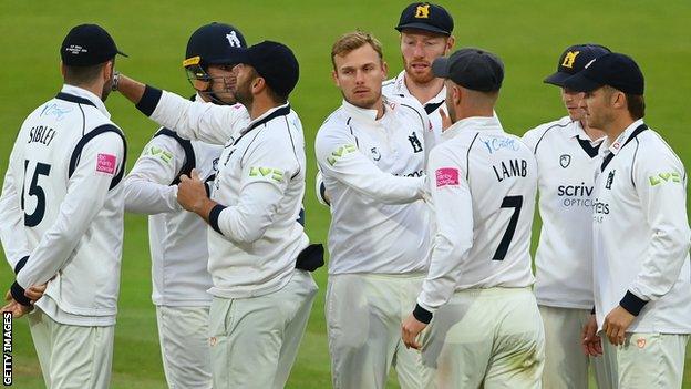 Danny Briggs celebrates the wicket of Steven Croft