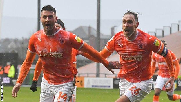 Gary Madine celebrates his goal