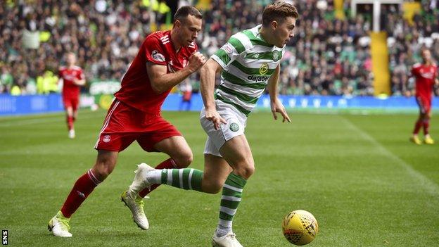 Aberdeen's Andrew Considine chases Celtic's James Forrest