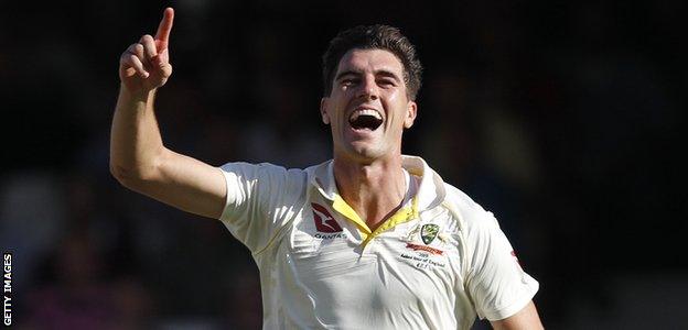 Australia fast bowler Pat Cummins celebrates dismissing England captain Joe Root during the final Ashes Test at The Oval