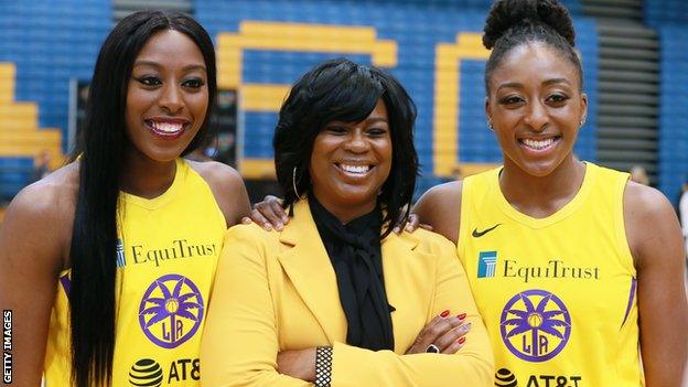 Penny Toler with Los Angeles Sparks players Chiney Ogwumike and Nneka Ogwumike