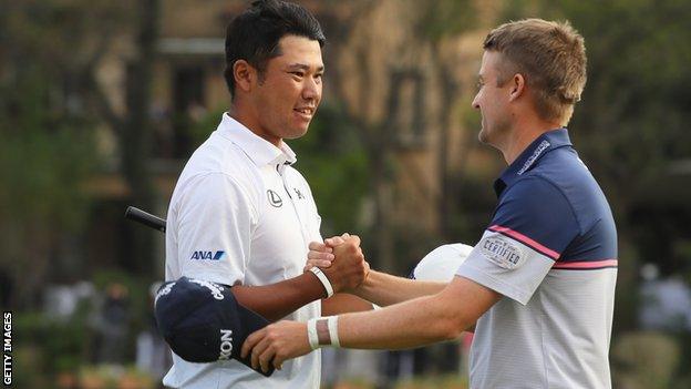 Russell Knox congratulates winner Hideki Matsuyama