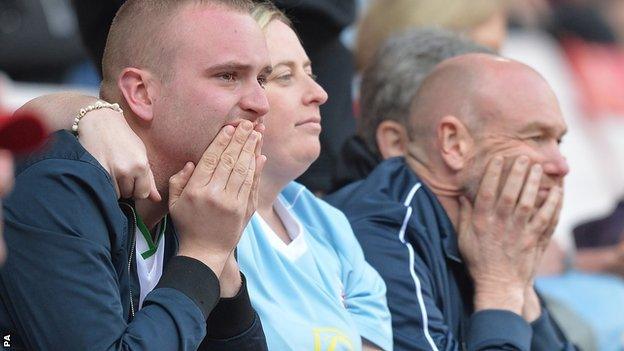 Dejected Sunderland fans