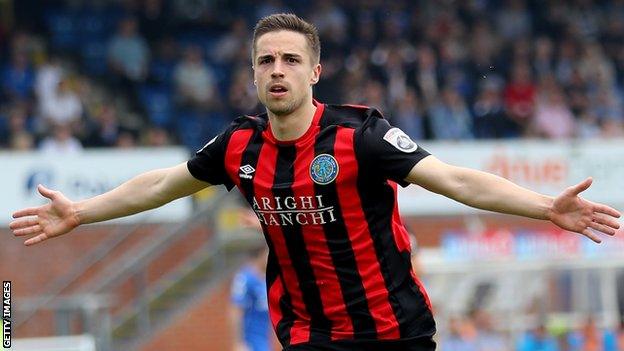 Mitch Hancox celebrates scoring a goal for Macclesfield Town