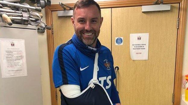 Kris Boyd with his arm in a sling