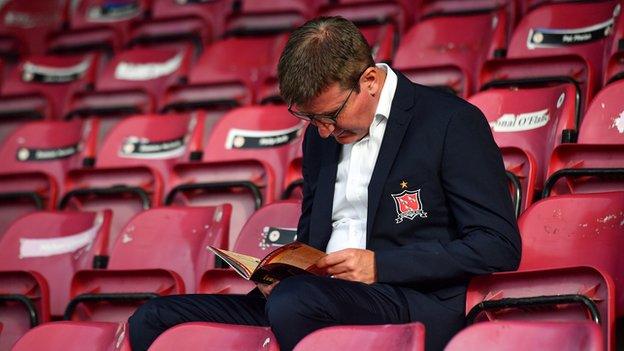 Stephen Kenny reads the programme