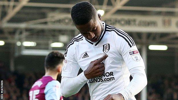 Ryan Sessegnon points to the Fulham badge as he celebrates his goal against Aston Villa