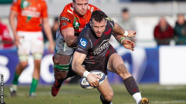 Gareth Davies smiles as he prepares to touch down for his first try against Benetton in Treviso