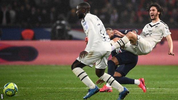 Neymar fouls Bordeaux's Yacine Adli