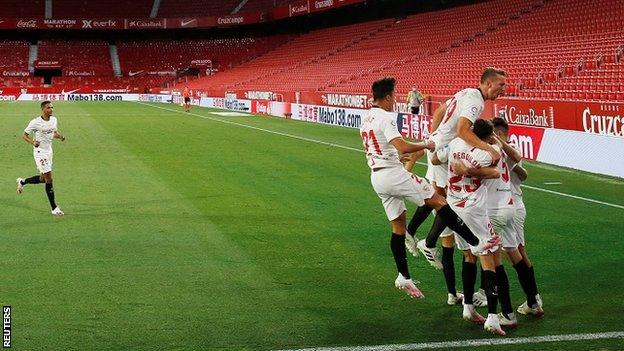 Sevilla celebrate their second goal