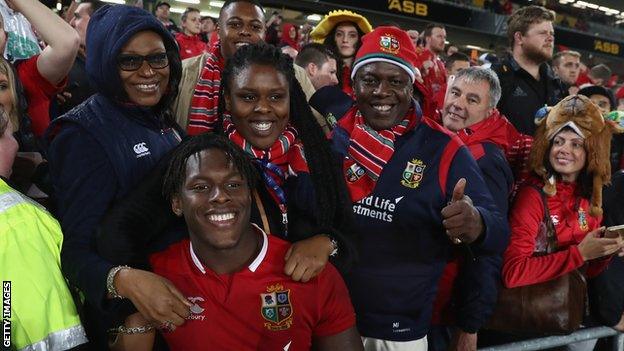 Maro Itoje and his family on the 2017 Lions tour