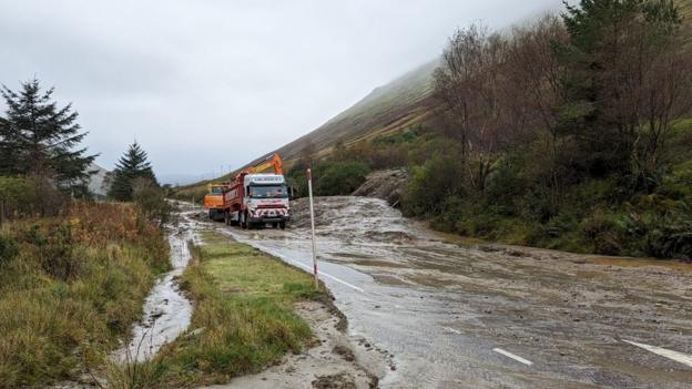 Landslide-hit A83 remains closed after flooding - BBC News