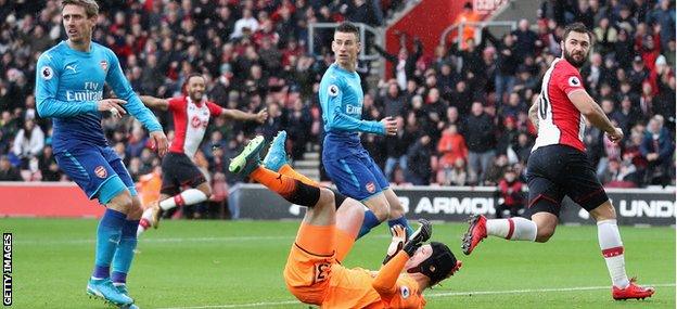 Charlie Austin scores the opener against Arsenal