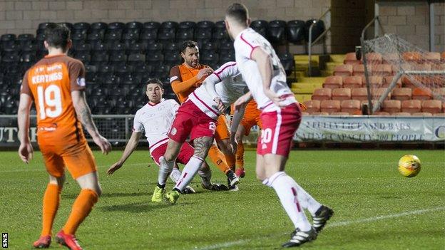 Scott McDonald scores