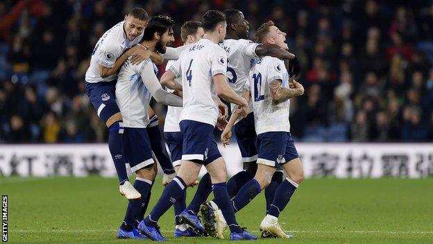 Everton players celebrate a goal against Burnley in December