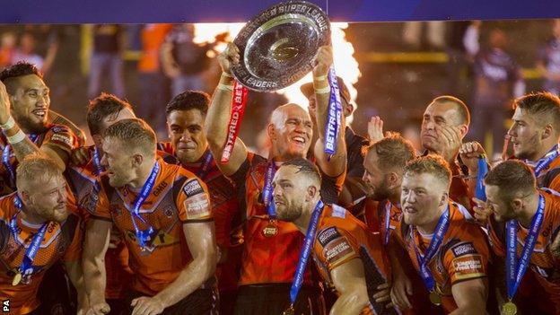 Castleford players celebrate League Leaders' Shield victory