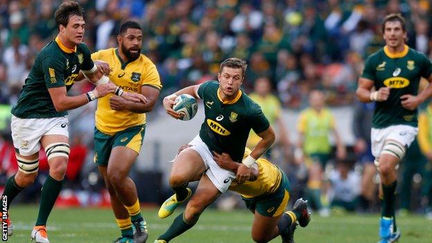 South Africa's fly-half Handre Pollard runs with the ball during the Rugby Championship match between South Africa and Australia