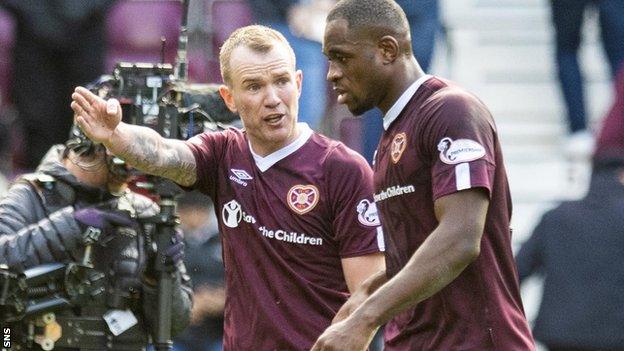 Hearts midfielder Glenn Whelan remonstrates with Uche Ikpeazu