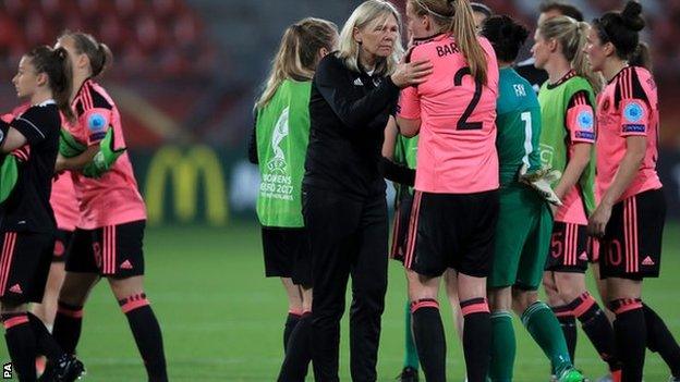 Scotland's head coach Anna Signeul (centre) comforts Vaila Barsley after the defeat