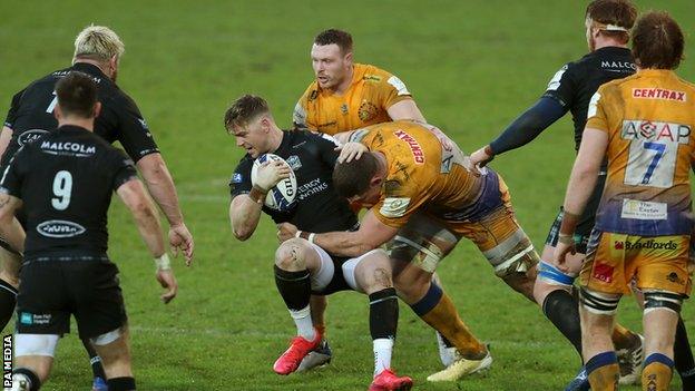 Glasgow's Glenn Bryce is tackled