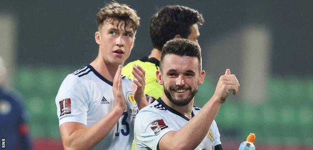 Jack Hendry, Craig Gordon and John McGinn celebrate at full-time