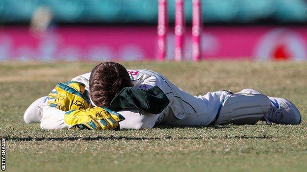 Tim Paine reacts after dropping Hanuma Vihari