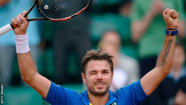 Stan Wawrinka celebrates his third-round win at the French Open