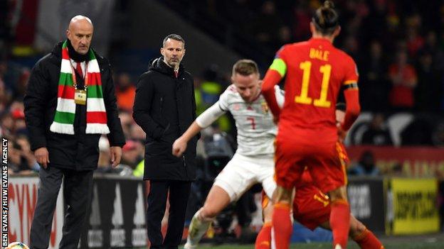 Wales manager Ryan Giggs (2nd L) watches Wales v Hungary