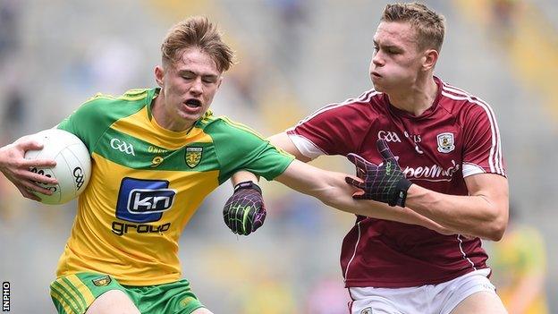 Donegal's Kieran Gallagher is challenged by Donegal opponent Sean Rafferty in the semi-final