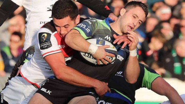 Toulouse’s Carl Axtens tries to dispossess Connacht’s Caolin Blade