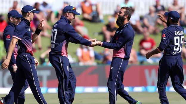 England celebrate a wicket