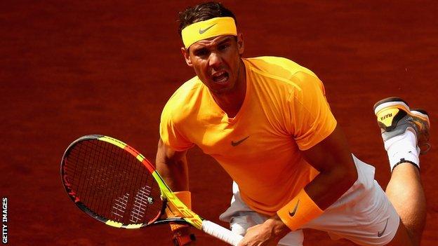 Rafael Nadal serves at the 2019 Madrid Open