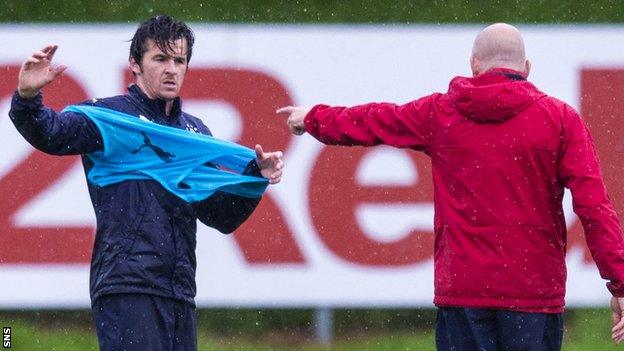 Joey Barton (left) and Rangers manager Mark Warburton