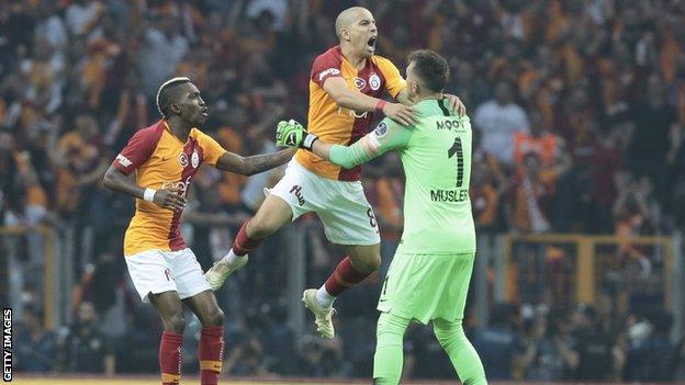 Sofiane Feghouli celebrates his goal with Henry Onyekuru and goalkeeper Fernando Muslera