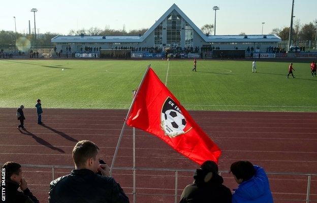 Fans at the 2018 Donbass Cup Winners' Cup final between Gvardeets and Dalevets from the Donetsk and Lugansk People's Republics respectively at the Kirovets Sports Club in Donetsk